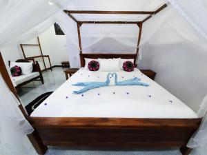 Letto o letti in una camera di Galaxy View Homestay Sigiriya