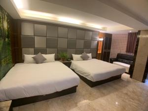 Postel nebo postele na pokoji v ubytování Michelle hotel