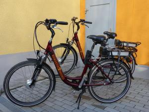 two bikes are parked next to a building at Schusters Haus in Boppard