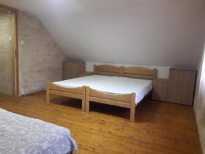 מיטה או מיטות בחדר ב-Stara Planina Stankovic