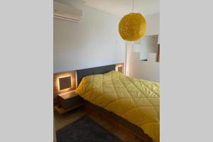 Letto o letti in una camera di Appt Bouznika EDEN ISLAND pied sur Mer