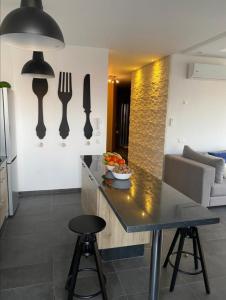 Area soggiorno di Appt Bouznika EDEN ISLAND pied sur Mer