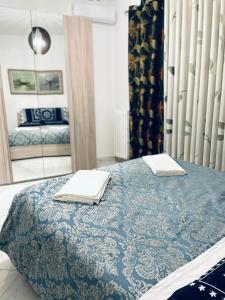 Posteľ alebo postele v izbe v ubytovaní CASA DEI FIORI