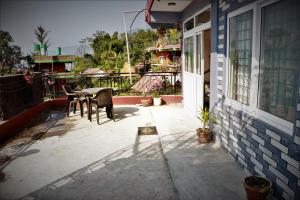 Thanapati Guesthouse的阳台或露台