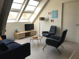 Χώρος καθιστικού στο Hendrikhof Appartement 3 ‘het Gebint’