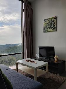 Televisyen dan/atau pusat hiburan di Ava Empire Damansara Modern High Floor Great Views