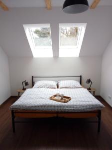 Postel nebo postele na pokoji v ubytování Penzion Maco Buchlovice