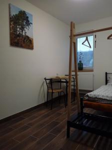 Postel nebo postele na pokoji v ubytování Penzion Maco Buchlovice