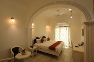 Voodi või voodid majutusasutuse Rangmahal Pushkar by DIV HOSPITALITY toas