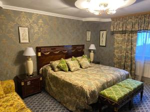 Кровать или кровати в номере Парк-Отель Konakoff