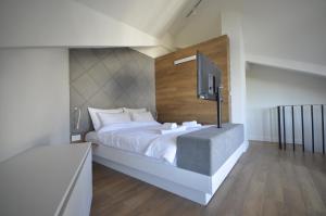 A bed or beds in a room at Beli bor
