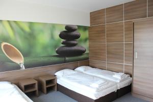 Кровать или кровати в номере Jordaszka +62 фотографии