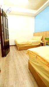 Letto o letti in una camera di Get Grace Hotel