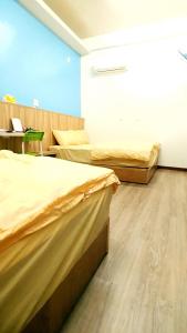 Letto o letti in una camera di Get Grace Hotel