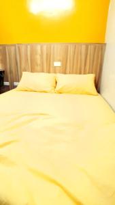 Letto o letti in una camera di Get Grace Hotel