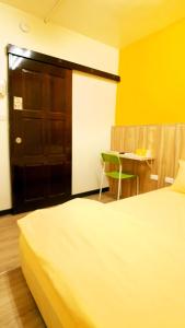 Letto o letti in una camera di Get Grace Hotel