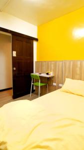 Letto o letti in una camera di Get Grace Hotel