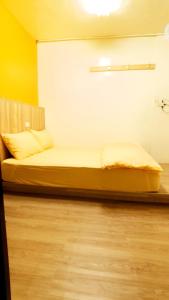 Letto o letti in una camera di Get Grace Hotel
