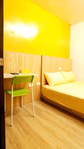 Postel nebo postele na pokoji v ubytování Get Grace Hotel