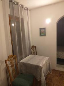 Katil atau katil-katil dalam bilik di Zeravica Rooms B&B