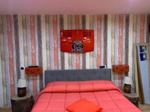 A bed or beds in a room at Eco Home