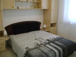 Posteľ alebo postele v izbe v ubytovaní Elizabeth apartman Siófok