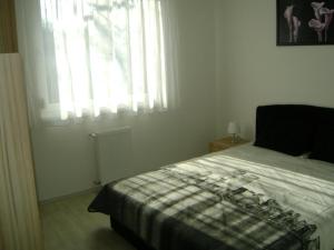 Posteľ alebo postele v izbe v ubytovaní Elizabeth apartman Siófok