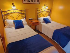 Łóżko lub łóżka w pokoju w obiekcie Hotel Rural Venta Del Alon