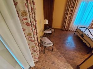 Łóżko lub łóżka w pokoju w obiekcie Hotel Rural Venta Del Alon