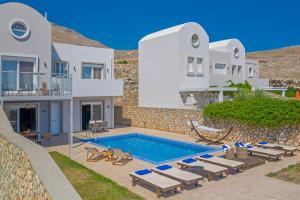 Bazén v ubytovaní Lindos Villa Agape alebo v jeho blízkosti