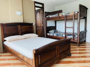 Postel nebo postele na pokoji v ubytování Hotel Kemarios