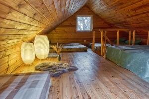Postel nebo postele na pokoji v ubytování Valkla Puhkekeskuse saunamaja