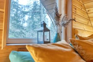 Postel nebo postele na pokoji v ubytování Valkla Puhkekeskuse saunamaja