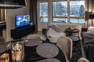 Et tv og/eller underholdning på Levin Kunkku B2 Apartment Grey