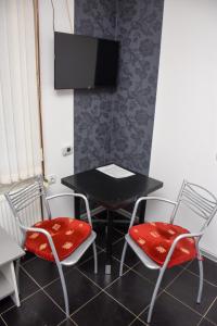 Μια τηλεόραση ή/και κέντρο ψυχαγωγίας στο Guest House Ceca