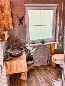 Koupelna v ubytování Ferienhaus Bergvagabund + 27 fotografií
