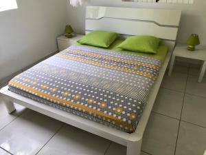 Postel nebo postele na pokoji v ubytování villa vue sur mer
