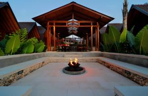 a fire pit in the middle of a patio at Bingin Lodge Uluwatu in Uluwatu
