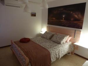 Llit o llits en una habitació de Apartament Dertosa