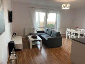 Posedenie v ubytovaní Apartament Wiewiórka