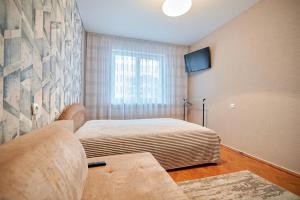 Cama o camas de una habitación en Holiday and Travel Apartment