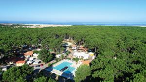 an aerial view of a house with a swimming pool at Camping Campéole Le Vivier - Maeva in Biscarrosse