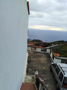 a view of the ocean from the balcony of a building at One bedroom apartement with sea view furnished terrace and wifi at Villa de Mazo in Villa de Mazo