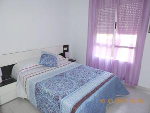 Katil atau katil-katil dalam bilik di Cozy Apartment in Dénia +9 gambar