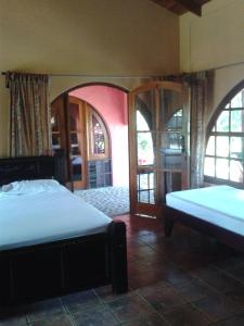 Krevet ili kreveti u jedinici u okviru objekta Hotel El Paraiso Escondido - Costa Rica