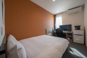 TV a/nebo společenská místnost v ubytování HOTEL R9 The Yard Utsunomiya chuo