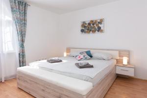 Posteľ alebo postele v izbe v ubytovaní Villa Marko