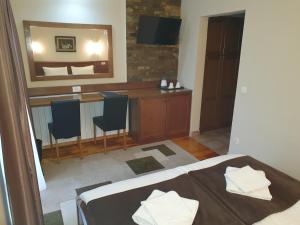 Postel nebo postele na pokoji v ubytování Hotel Tara