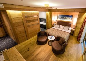 Voodi või voodid majutusasutuse Nendaz 4 Vallées & SPA 4* Superior toas
