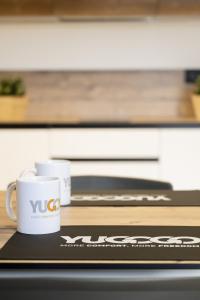 Coffee and tea making facilities at YUGOGO PELLICO 8 Trento Centro